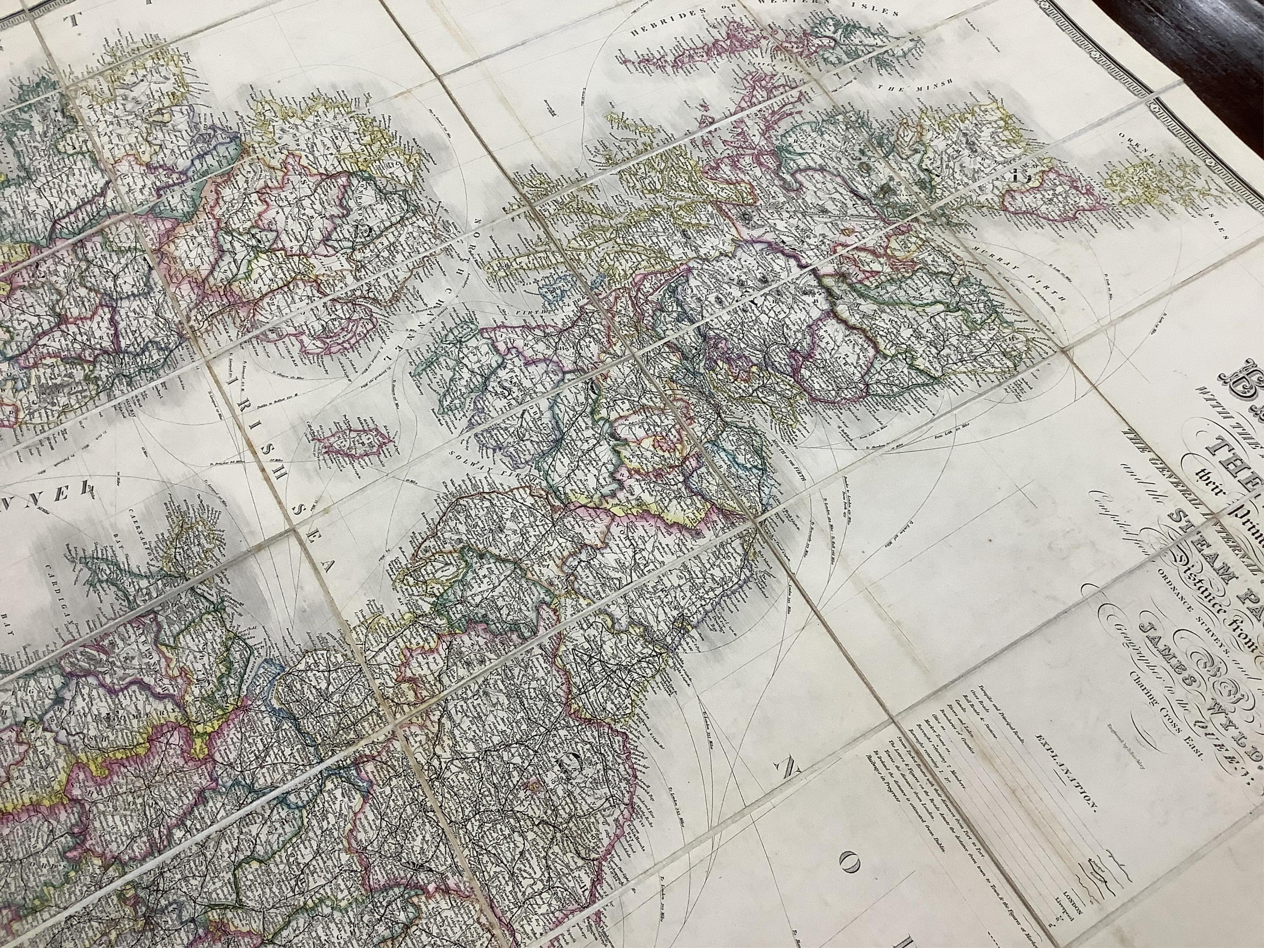 James Wyld, a mid-19th century cloth mounted map of the British Isles, including the line of railways, their primary and intermediate stations, etc. engraved by S. Stockley, in a slip case. Condition - poor to fair.